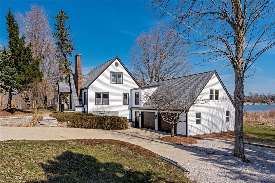 Welcome to this fully reimagined lakefront retreat! Perfectly positioned on the tranquil shores of Twin Lakes, this beautifully renovated 3-bedroom, 2 full and 2 half-bath home blends modern style with peaceful lakeside living—just minutes from vibrant downtown Kent. Inside, you’ll find an open, light-filled layout with high-end finishes throughout. Expansive windows frame stunning water views, while spacious living areas create an ideal setting for relaxing or entertaining. This rare opportunity offers comfort, elegance, and a true connection to nature. A must see! Schedule your private showing today!