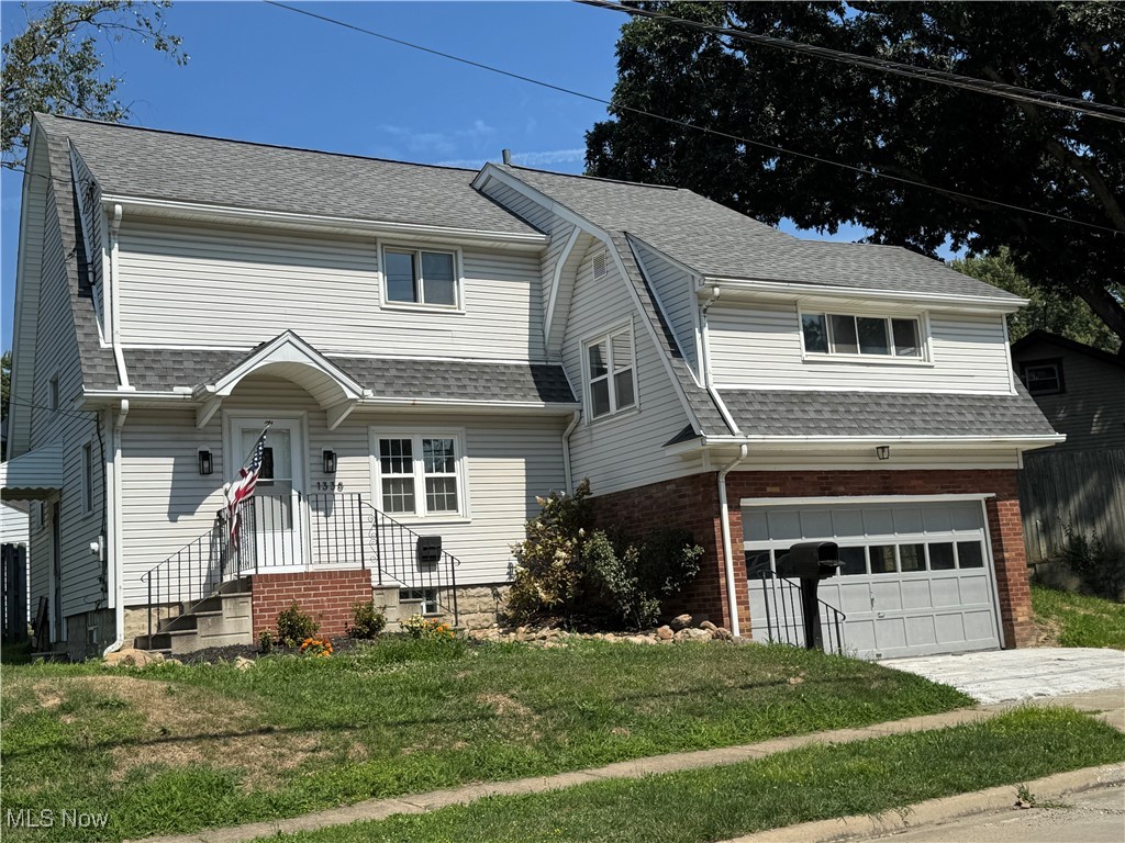 You will love this beautifully updated home with so many modern conveniences and luxury features that you can see yourself enjoying life in this residence soon. Flooring throughout the first, second and third floor areas is new in 2025. This floor plan is so unique and desirable as the large master suite is only a few steps above the first floor living space, while the 2 large secondary bedrooms are on the typical second floor which is on the opposite side of the house, offering the master bedroom more privacy. The kitchen and dining area are open to the living room while the brand new modern cabinetry with a quartz countertop will impress you and your guest. The new stainless steel appliances that include the refrigerator, dishwasher and range will be a convenience that you will not need to replace. The cabinetry includes a handy pantry for all the staple items you want to store near your food prep area. Both full bathrooms are totally renovated, from the lighting to the flooring with new toilets, and a bath-shower combo unit in one, to the glass enclosed master shower in the other full bathroom. The garage is attached with an almost secret stairway to it. Yes this is a unique floorplan, no cookie cutter design here. Don't forget to peak at the study loft that sits above the master bath area. A great space if you want a home office away from the action in the first floor living space.
The yard is perfect for the home owner who wants an easy yard to care for. There are new appliances in the basement with a new washer and dryer, offering more convenience for you. This vinyl sided home has a 5 year old roof, also the furnace was new in 2023, The electric panel box was new in 2020. Make your appointment soon.