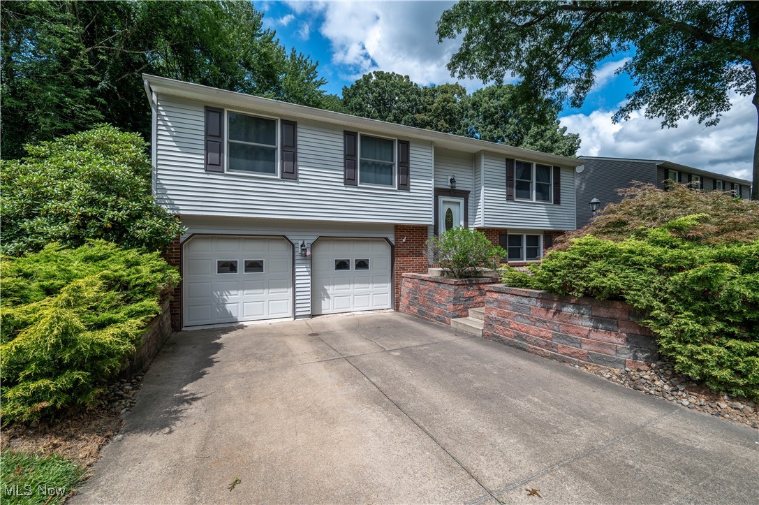 Welcome to your dream home! Nestled on a beautifully landscaped half-acre lot, this updated 3-bedroom, 2.5-bath gem offers space, comfort, and style both inside and out.
Step into the modern kitchen featuring newer stainless steel appliances, updated cabinetry, and sleek finishes—perfect for everyday living or entertaining guests. The updated bathrooms add a touch of luxury, while the spacious master suite includes its own private bath for added convenience. Enjoy cozy evenings in the lower-level family room, complete with a bar area, ideal for relaxing or hosting friends. Step outside to your park-like backyard with mature trees and a large deck, providing a private oasis for outdoor dining, entertaining, or simply soaking in nature. Additional highlights include:Attached 2-car garage, New furnace and air conditioning for year-round comfort. Excellent curb appeal and a quiet neighborhood setting
This move-in ready home has it all—location, upgrades, and space to live and grow. Don’t miss your chance to make it yours! Schedule your showing now!