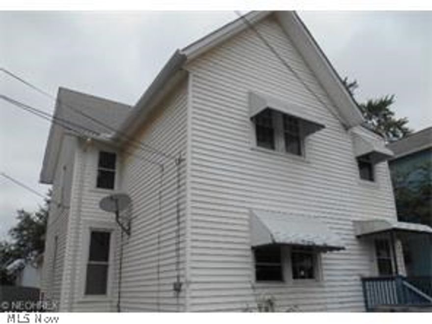 Live in one unit and rent the other two. Needs some work.