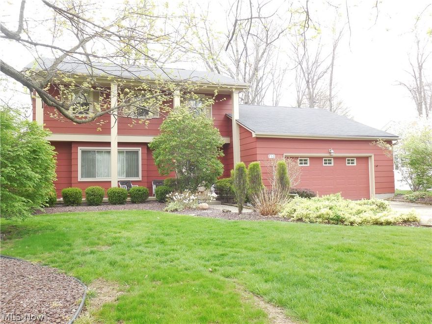 Pride of ownership shows in this 2 story 4 bedroom 4 bath home. Huge kitchen with custom oak cabinets by Kraft maid, newer laminate floors, and appliances to stay. Family room with wood burning fireplace, window seat, 2 closets, and panel walls. Formal living and dining room with newer windows. 1st floor laundry room with built-in iron board. Beautiful sun room with 2 skylights and wood ceiling. Master bedroom with walk-in closet plus double closet. The master bath has newer ceramic tile floors with 2 sink areas and shower. Another full bath 2nd level with ceramic tile floors double sink tub/shower combo. Plus 3 more bedrooms. Finished basement with rec room and office with new carpet, plus large storage area.Newer forced air Heil furnace and a/c. 200 amp electric 40 gallon hot water and full bath with ceramic tile floors shower only. 2 1/2 car garage with new garage door, door opener, pull down stairs for tons of storage. Nice front Porch area and large side deck which wraps around ba