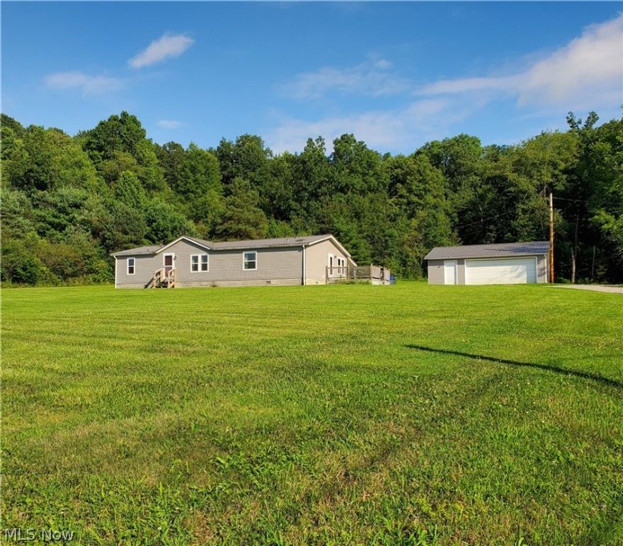 Available again through no fault of the home! Live Abundantly in this beautiful, country setting. This lovely, 3 or 4 Bedroom home on just under 2 acres is just the place for you to relax and rejuvenate. With an open concept floorplan, the large Living Room and Dining Room move easily into the updated kitchen with richly colored cabinetry and counters, newer, stainless appliances, and a sunlit Breakfast Nook overlooking the sunny, freshly painted deck. Just beyond that is a roomy Laundry Room that includes the Washer & Dryer! The Master Bedroom is spacious, has a great walk-in closet, and a bright, very recently updated bath. There is a fantastic room right off the Living Room with double doors and a closet that would make either a convenient Office, or the perfect 4th bedroom. The two additional Bedrooms at the end of the main hall are accompanied by a cheery Full Bath, and a handy linen closet. The covered Patio off the Dining Room leads to a giant back yard, which means plenty of ro