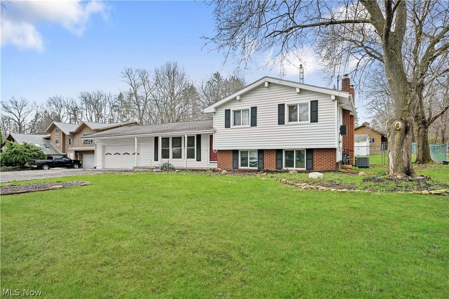 Well maintained split level home on a dead end street in Green LSD, offering 3 bedrooms, 2 full bathrooms, a 2 car attached garage, and a .61 acre lot. Fresh paint throughout, hardwood flooring in the bedrooms, LVT in the kitchen and main living and dining areas, and tile in the lower level create a clean and updated feel. The layout offers multiple living spaces including a living room and family room, plus a sunroom off the dining area with sliding doors on three sides that open directly to the backyard. 
Enjoy a backyard setup made for entertaining with an in ground pool ranging approximately 4 ft to 12 ft in depth. The pool was painted in 2020 with pump and filter replaced in 2020, and was inspected, cleaned, and maintained in 2025. The pool has been winterized with a partial water level. Additional updates include windows 2019, hot water tank 2021, AC 2023, new flooring throughout main areas, and a new garage floor. Well inspection has been completed and passed with a new well pump and pressure tank installed. Call to schedule a private showing today!
