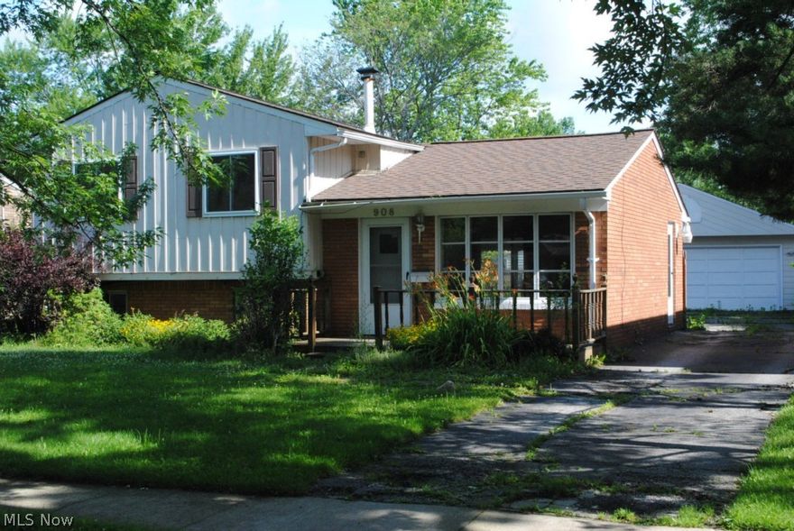 BANK OWNED ... Brick And Aluminum Sided Split Level ....  3 Bedrooms, 2 Full Baths .... Large Living Room .... Family Room In Lower Level With Walk Out ....  Eat In Kitchen .... Covered Patio .... Deck .... 2 Car Garage ....