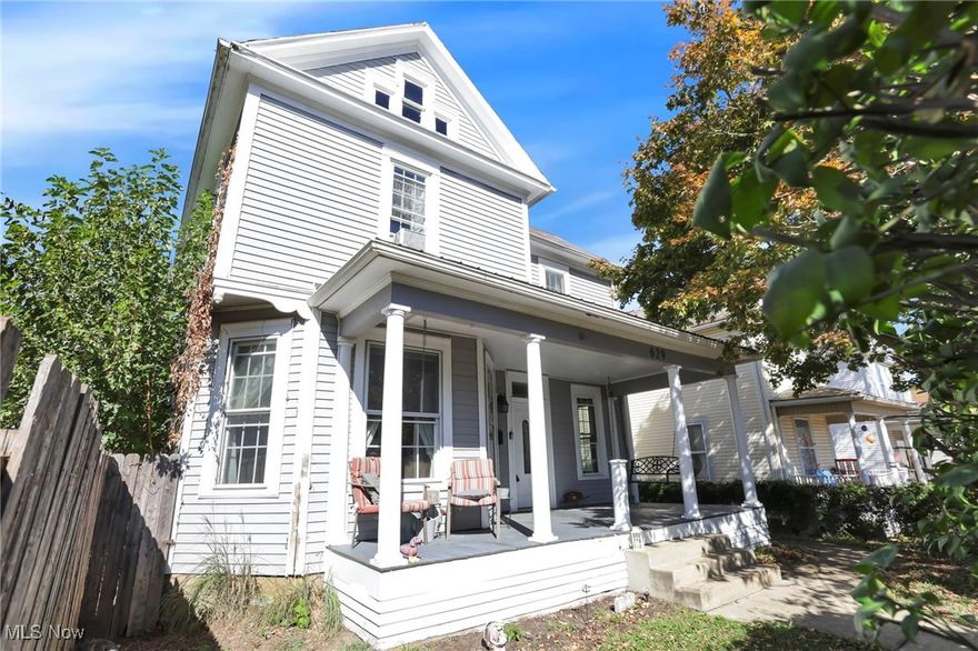 Welcome home to this beautifully maintained 3-bedroom, 2.5-bath home that perfectly blends timeless character with modern convenience. Step into the stunning open foyer and be greeted by gorgeous hardwood floors that flow throughout the bright living room and formal dining room—complete with built-ins for added charm and functionality. The contemporary kitchen is a dream for any home chef, featuring abundant cabinetry, generous counter space, and a full suite of appliances. A versatile adjoining area provides the perfect spot for a home office, mudroom, or additional prep space, and opens directly to the brick patio and large fenced-in backyard—ideal for entertaining or relaxing outdoors. Upstairs you'll find 3 bedrooms including a spacious en'suite with a beautifully tiled shower and ample closet space. A second full bath serves the additional bedrooms, while a main-floor half bath and laundry add everyday convenience. Large attic space and basement offers tons of extra storage space. Enjoy evenings on the inviting covered front porch with swing or take advantage of the spacious detached garage with an upper loft—offering ample storage or potential for a creative workspace. This home is full of character, tons of natural light, and thoughtful details. Don't wait - call to schedule your showing today!