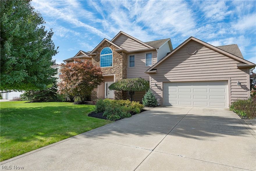 Beautiful, bright 4-5 bedroom 4.5 bath home, laid out for modern living.  Two story foyer opens to both formal living and dining rooms.  Large family room with wood-burning fireplace.  Large eat-in kitchen with center island and built-in desk opens to backyard patio, convenient for grilling.  Bedroom/office on first floor with built-ins.  Attached 2 car garage leads to mudroom, laundry room and full bath.  Powder room completes the first floor.  Second floor includes large master suite with two large walk-in closets, en suite bath with separate shower and jetted tub, two sinks/vanities.  Three more bedrooms with large closets, one with private bath, and a third full bath complete the second floor.  Large partially finished basement with plenty of storage space.  House has many additional features, including concrete driveway, furnace replaced 2018, newer air conditioner (2007), newer hot water tank (2014), newer garage door and garage opener (2013) and spring (2018), some newer windows