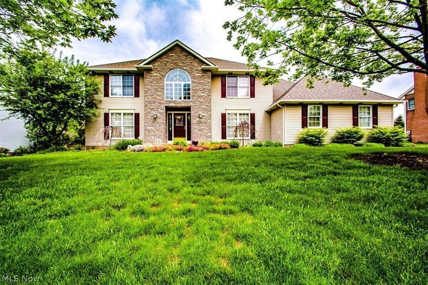 Beautiful Skip Rae built home. Private backyard. Oversized two car garage. Four large bedrooms. Master bathroom has been updated - large walk in shower..6x4. Open kitchen with granite countertops, large island. Fully applianced kitchen. First floor laundry.