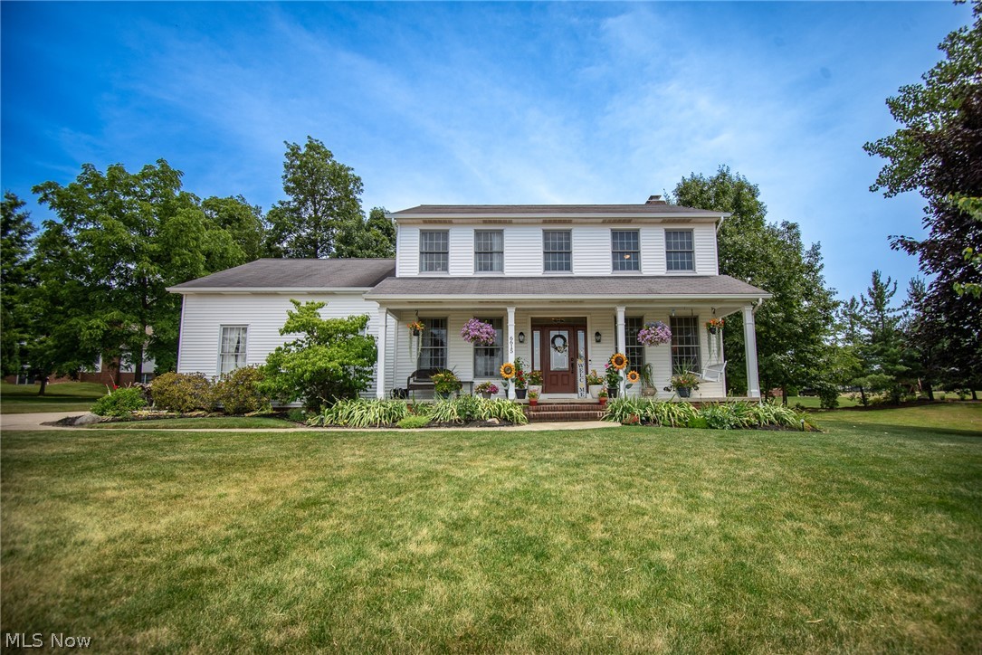 Welcome to this 4 bedroom, 4 (3 full/1 half) bath, 2300+ sqft colonial with 3 car garage and stamped concrete patio nestled between trees on just over half an acre on a cul de sac. Enjoy sipping your morning coffee on the charming front porch overlooking the lovely landscaping. The front door opens to the foyer with an open staircase, 9' ceilings throughout, a formal dining room or office space to the left, and a cozy family room to the right. Beyond the foyer is the bright, spacious eat-in kitchen hosting ample cabinets, granite countertops, backsplash, and stainless appliances. Overlooking the kitchen is the family room with a gas starter wood burning fireplace and sliding door and Trex decking steps with lights providing access to the patio and parklike backyard. The outdoor patio heater has a natural gas hookup. Completing the main level is a half bath featuring a quartz top vanity. Upstairs holds the master suite with a private full bath with a soaking tub and 2 walk-in clos
