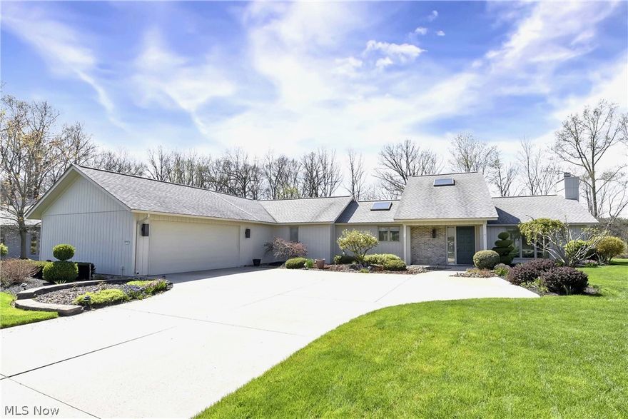 Stunning single-owner ranch home boasting nearly 3,000 sq ft of living space, nestled within the coveted Ridgefield Community. Quality crafted by renowned builder Bob Schmitt, this home has been cherished by and host to three generations of family. Upon arrival, you're welcomed by lush landscaping, side load garage with convenient turnaround, all set on a charming wooded lot. Step inside to discover natural light streaming through floor-to-ceiling Pella windows, accentuating picturesque views. Custom window treatments add a touch of elegance while filtering light throughout. Expansive great room impresses with vaulted ceiling, gas fireplace and built-in shelving. This versatile space is ideal for both formal gatherings and cozy lounging, offering ample room for seating arrangements and dining. Adjacent kitchen continues the theme of grandeur with soaring ceilings, skylight, and Pella slider leading to outdoor bliss. Abundant white cabinetry, countertops, wall oven, and wheelchair-accessible center island with prep sink. Spacious walk-in pantry, desk, and shelving complete the culinary haven. Neutral palette throughout sets the stage for any décor while generous closet space and built-ins offer ample storage solutions. Three well-appointed bedrooms feature closet organizers and recessed lighting. Primary suite features an incredible walk-in closet and Pella slider to the private backyard. En-suite bathroom boasts built-in linen cabinets, ramp to the walk-in shower, dual sink vanity, and large soaking tub overlooks the lush backyard. Outside is a tranquil patio perfect for enjoying the serene surroundings. Geothermal heat and cool ensure year-round comfort. Oversized garage with ramp to the mud/laundry room entry. Rec center features pool, clubhouse and playground, enhancing the lifestyle of this special neighborhood. Conveniently located near a plethora of amenities, this meticulously maintained home offers an opportunity to experience the epitome of suburban living.