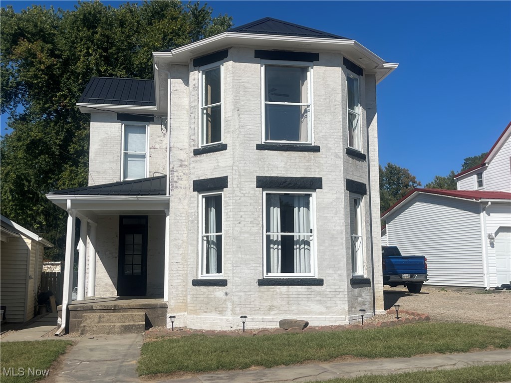 Beautiful Historical Two Story in Crooksville with lots of updates! Public utilities-New Roof, Covered Front and Back porches, kitchen with new flooring, counter tops and appliances, three bedrooms, large rooms, two car garage with workshop area, fenced back yard to let your peeps play!