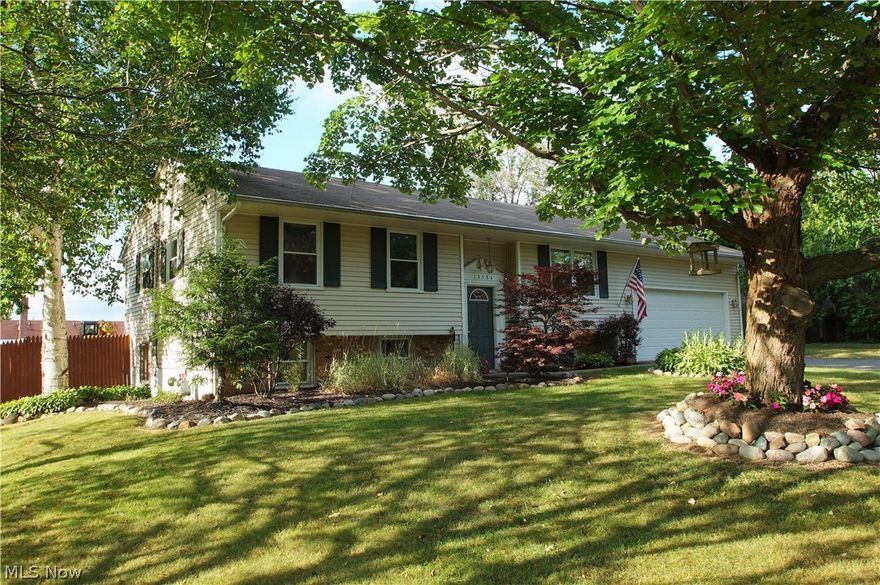 Great find in this move in ready home just a walk to Burton Square. Set on a quiet side street this 4 bedroom, 2 bath home is beautifully landscaped, very well maintained and offers a spacious floor plan. Open and bright kitchen leads to a relaxing deck with fenced in yard. Large family room for entertaining opens to the eat in kitchen. Over sized laundry room. Extremely well kept and remodeled just before last purchased. Nothing to do but move in.