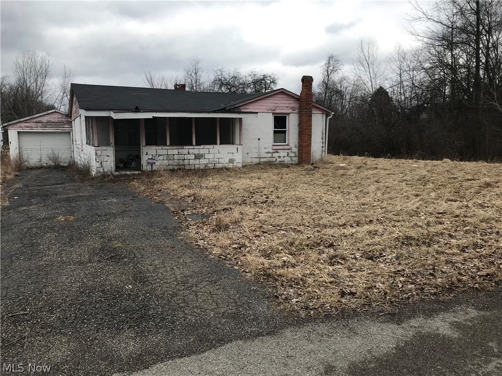 Investor special!! Being sold AS-IS. Home is in disrepair. Please DO NOT approach house or try to enter house, there is NO lock box, NO entry available. Value is mainly in the land (2 parcels).