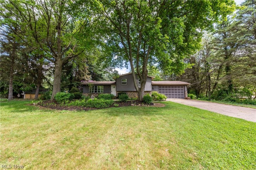 Beautifully updated split level located in a cul de sac in Jackson Schools. This 3 bedroom 2 bath home offers an amazing custom kitchen with Kraftmade Cabinets, corian countertops, stainless appliances and storage galore. 2 skylights let in tons of natural light into the kitchen. The whole inside of the house has fresh paint and new carpet. Bonus room off the kitchen with hardwood floors overlooks the private backyard. Large front room with bay window. Downstairs offers a family room with fireplace, mudroom off the garage, and a full bathroom. Unfinished 4th level adds tons of additional storage. Upstairs has 3 bedrooms and a second updated full bath.