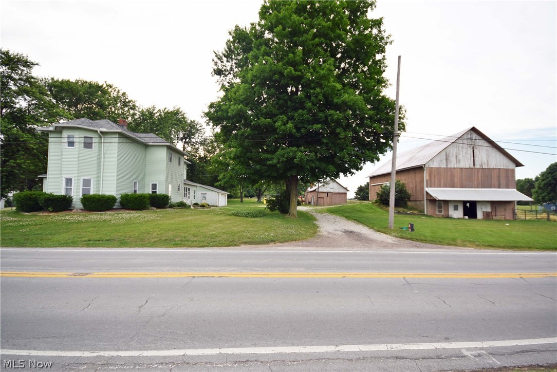 Opportunity knocks! Great property with century home, large barn, shed, and detached garage all on over 3.5 acres in Smithville Schools. 4-bedroom home with 1 and a half baths, both remodeled in 2015. Large living rooms on the first floor including kitchen with eat-in area, living room and family room. One bedroom is on the first floor. 3-bedrooms upstairs along with the updated full bath. New roof, gutters and downspouts in 2015. Outdoor wood stove which can provide heat and hot water for the house. Full size barn with open lower level access to the pastures. Shed houses the outdoor wood burner and detached garage next to the house. Great opportunity! Don't miss out on this one! Call and schedule your showing today!