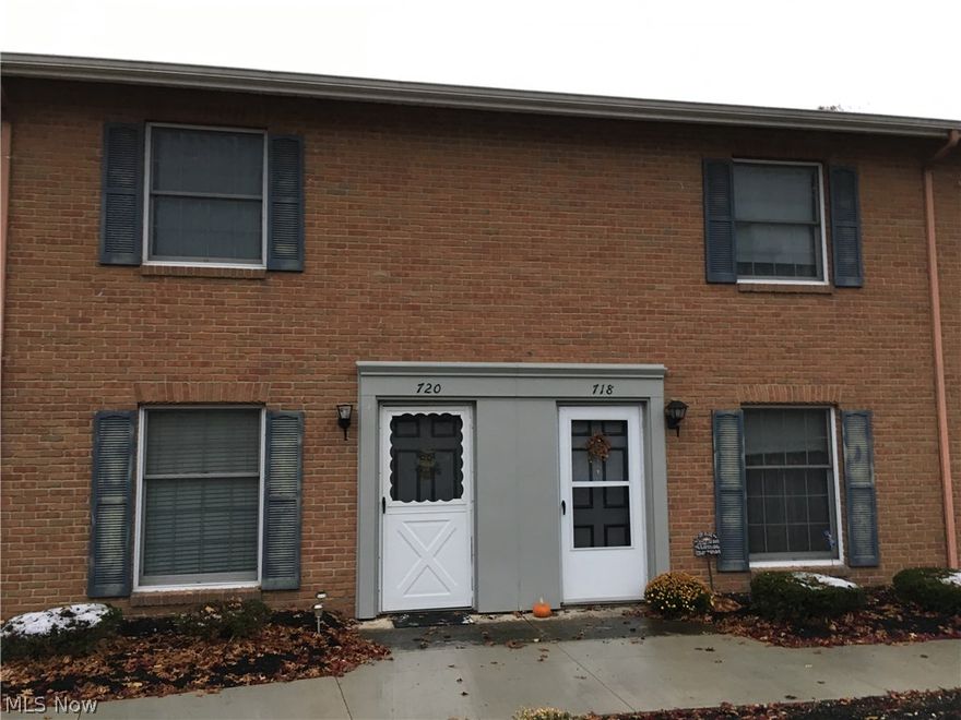 Well maintained condo with 2 bedrooms, 1-1/2 baths.  Large eat in kitchen with ceramic floors, 1st floor laundry off kitchen, 1st floor half bath.  Master bedroom has private balcony overlooking wooded lot.  Home has new carpet, kitchen freshly painted, large closets, sliding doors from kitchen to patio with privacy fence facing woods.  Covered carport.