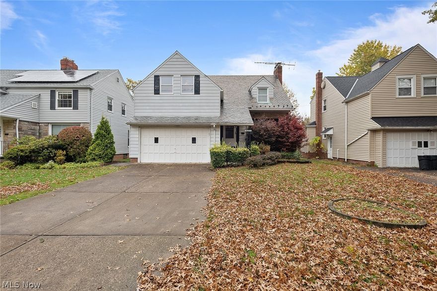 University Heights premiere location! Easy access to everything. Huge lot and 2 car attached garage! All four bedrooms on 2nd level. This unique and spacious home has a 2nd staircase leading to the bedrooms as well as the main access through the front of the house. Half bath off kitchen. 2 full baths upstairs! Basement has a second area with large glass block windows that might be perfect for today's school and work-at-home arrangements. Buyer will assume city violations.