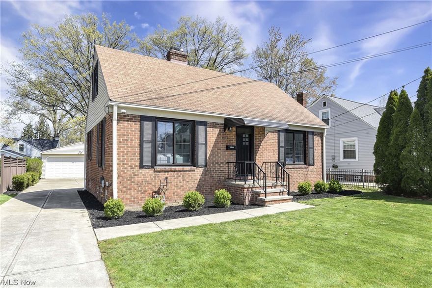 Welcome to 23800 East Oakland Rd. Bay Village, OH 44140, a stunning 1782 sq ft fully renovated bungalow with timeless character and modern updates. Situated in a lovely neighborhood, this home offers 3 bedrooms, 2 bathrooms, and a partially finished basement. As you enter through the front door, you'll be welcomed by neutral tones, beautiful floors and a warm fireplace with sleek mantle and playful penny tile accents. The main level features a fully renovated eat-in kitchen with counter to ceiling subway tile backsplash, breakfast bar and all new lighting, a primary bedroom with plenty of natural light, and a luxurious full bathroom. Upstairs you will find two additional sizable bedrooms with original hardwood floors and plenty of storage space.The partially finished basement offers plenty of room for activities, another gorgeous full bath, as well as a laundry room and storage. Step outside and enjoy the 3 season sunroom overlooking the backyard. This home boasts an all brick exterior