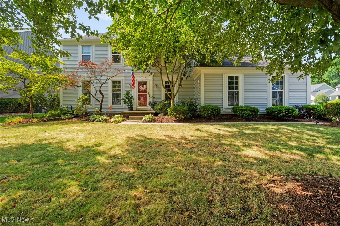 Charming traditional 4 bedroom 2.5 bath home in quiet neighborhood. Lovely corner lot next to cul de sac. Gleaming hardwood floors in main living areas. Updated kitchen and baths.
Family room with bookshelves and fireplace.
4 season sunroom stepping on to private newly fenced backyard with lush landscape. Finished lower level with rec room, storage and office area. This home will not disappoint.