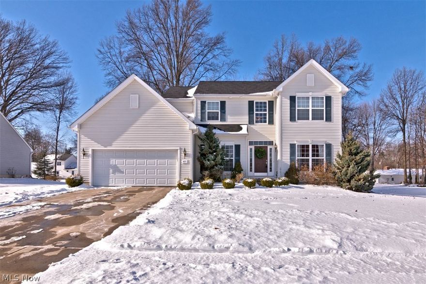 Why build when you can buy this immaculate newer construction in the heart of Amherst? This striking colonial features over 2,300 square feet of beautifully finished living space with an open concept floor plan and a beautiful back deck; all it needs is you! Gleaming hardwood floors great you in the two story foyer, with a sunny home office to the right and a dining room with a tray ceiling to the left. With a wall of windows and a lovely stone fireplace, the great room is open to the kitchen, great for entertaining. The kitchen features all newer appliances, an island, and an eat-in area with sliding glass doors that open to the deck, so you can easily take meals right outside. A laundry room with built-ins and a half bathroom complete the first floor. Upstairs, there are four bedrooms and two full bathrooms, including the spacious master suite. The full lower level is just waiting to be finished into a home gym or playroom. Outside, you can enjoy summer cookouts on the lovely back de