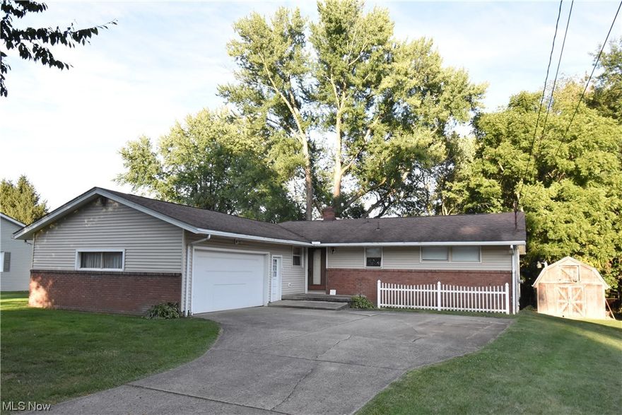 This spacious CANFIELD SCHOOLS 3 bedroom, 3 full bath ranch home sitting on over a 1/3 of an acre in a quiet neighborhood awaits your ownership.  Enjoy first floor living with large kitchen accompanied by island and eat in/dining area, family room, living room with fireplace, 3 bedrooms (including ensuite off main bedroom), additional full bath, and enclosed patio/porch with Jalousie windows.  The partially finished full basement opens your palette to so much potential.  The basement includes large wet bar with entertainment area, a second fireplace, another full bath, and a walkout entry.  Additional features include, hardwood flooring throughout much of home, shed, whole house fan, laundry chute, attached 2-car garage and more.  Close to shopping, restaurants, and many more amenities.  Don’t let this opportunity pass you by to live in this neighborhood.