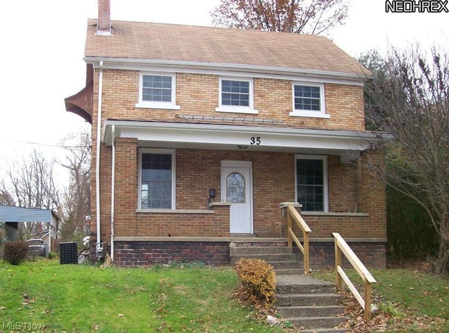 This exceptional home is like a new built interior inside a classic 2-story brick home! The big, newer windows, newer carpeting and flooring, paint, cabinets, appliances, bath and kitchen plumbing makes you feel as if you're in a model home at a home show! Convenient, bright kitchen has lots of newer cabinets, over the range microwave, dishwasher and garbage disposal and opens to the nice sized dining area. Both bedrooms feature walk-in, cedar closets. Newer back deck off the kitchen area is great for grilling or overlooking the semi-private back yard. This home will please the most discerning buyer.