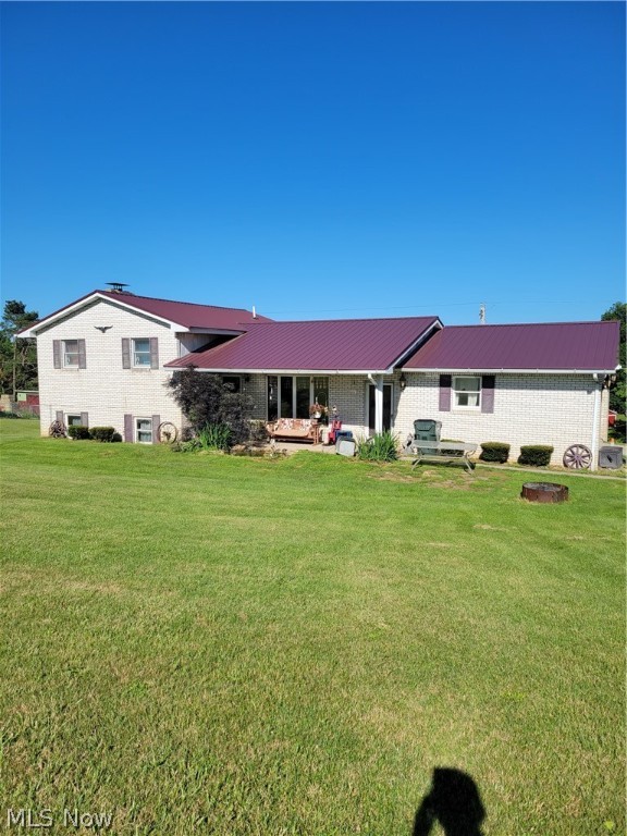 MOTIVATED SELLERS!!! Nice Brick, Tri Level home on 1.06 acres in great location. 3 bdrm, full bath on upper level. Main floor is living rm (currently dining rm), kitchen with dining area. 2 lower levels; 1st has large family room with wood burning fireplace and wet bar. The 4th level has another full bath, laundry room and a bonus room, could be office or 4th bdrm, (currently used for storage). There is a 2 car attached garage and a detached, 24' x 32' pole barn garage.
All flooring, except dining room, were recently replaced. Roof was replaced in 2016; some plumbing replaced in 2018-2019; furnace and central air replaced 2011; Hot water heater new 2021. 200 Amp electric. Septic tank cleaned April, 2021. New leach lines to be installed.