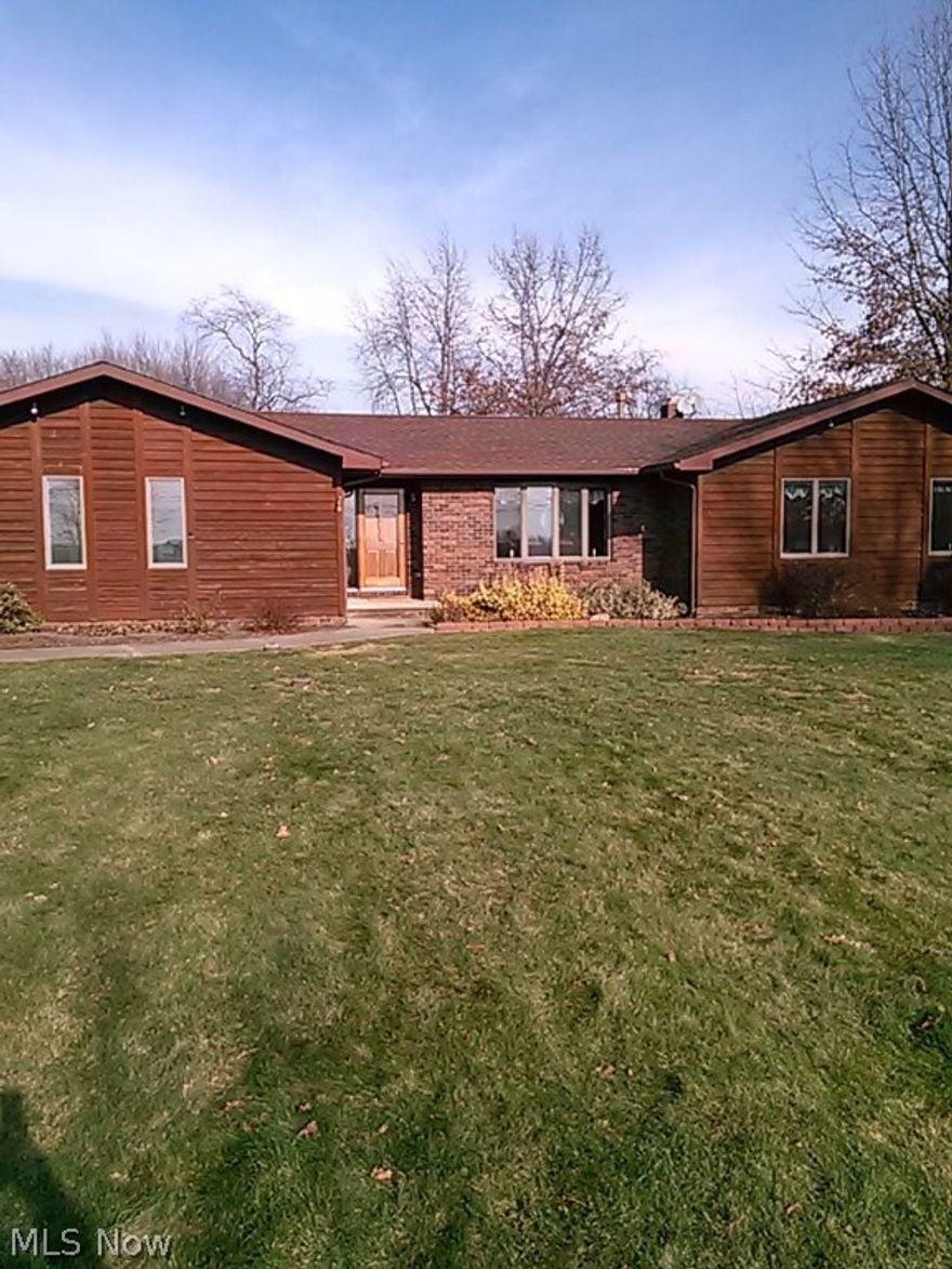 This beautifully detailed ranch is on almost 2 acres of landscaped property.  Home has Hickory and Oak floors along with large bedrooms and large closets.  Home has all newer stainless appliances in kitchen and new washer and dryer in the spacious first floor laundry.  Homeowners spared no expense on all updates which are easily seen throughout the house.  Large premium Anderson windows throughout for sun and pleasurable viewing.  A newer 50 year dimensional roof was added.  Lower level is wonderful with a wood burner and wood, carpet and stone floors.  For added ease lower family room is a walk out.  With an Anderson slider to patio and back yard.  Outside is a spacious 12x40 deck on the back of the home and a 24x30 2.5 car extra garage was added with 220 amp electric and fully insulated.  ALSO, a 12x20 barn in the back yard with dog kennel attached and side storage area and vinyl sided.  Added features: New Kenetico drinking water system, new hot water tank & 200 amp service (2014).