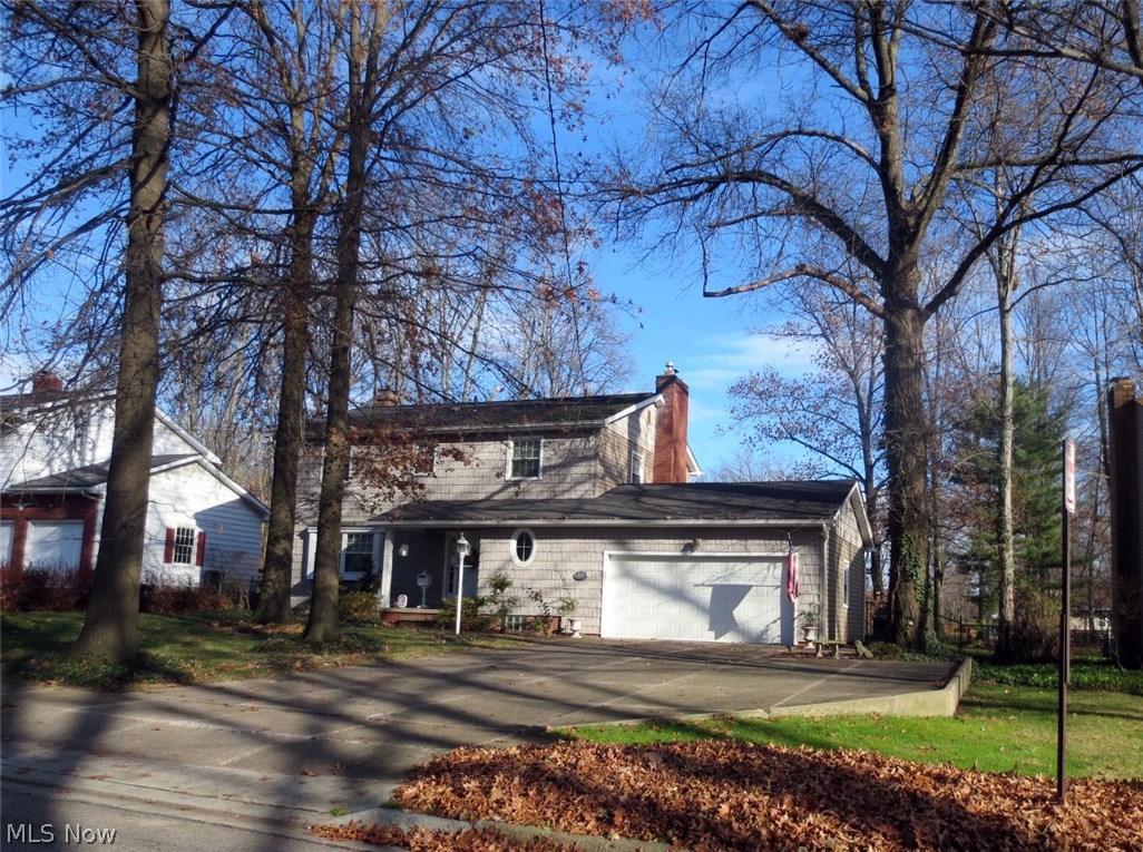 This is truly a "must see" home. Located in a prominent area of Stow. This property was remodeled on 1st floor, in the 1990's. It's a very open floor plan and perfect for entertaining! There are 2 fireplaces, one in kitchen and the other in great room. All of the windows are have been updated. There is a new Sun Room that is "four season" and certainly could function as a family room on the 1st floor. There is a large laundry room on 1st floor directly off the foyer hallway. There are four good sized bedrooms on the 2nd floor, including an "on suite" bathroom. The basement is nicely finished with recreation room and 5th bedroom and there is still plenty of unfinished basement for storage. This home truly has the perfect sized back yard for an active family. Back yard is completely fenced and there is a large storage shed that was built by the Amish. Home was rewired in 2011. Fire pit in the back yard.