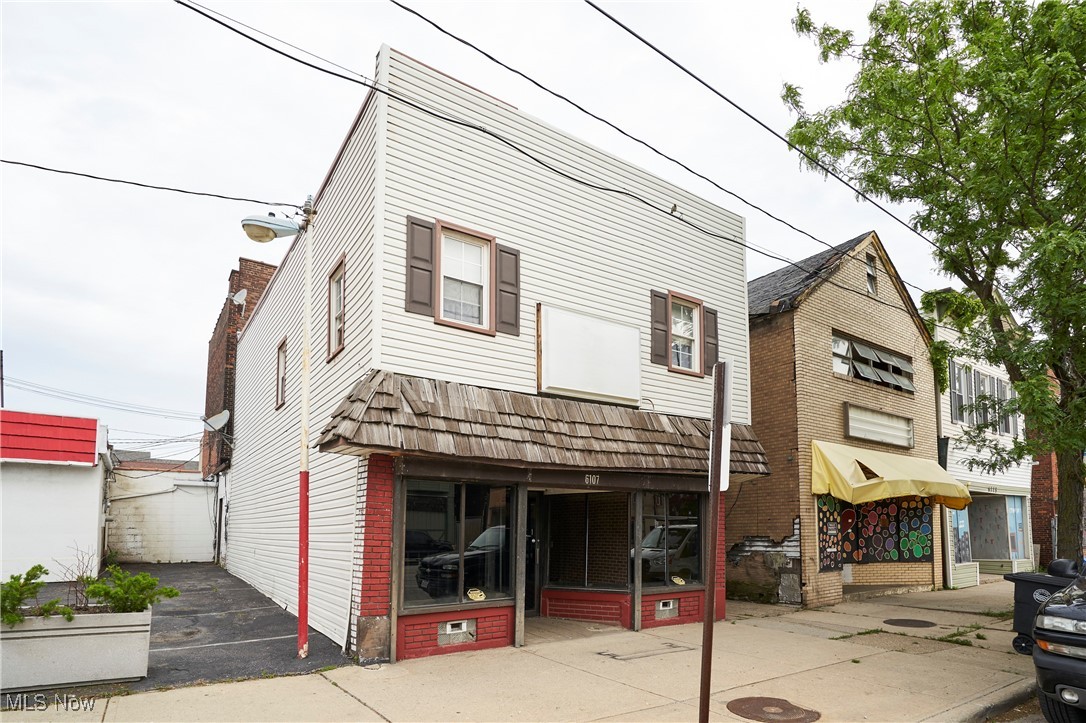 Available For Rent! Perfect for a retail space or an office. Great location near restaurants, drug store, St. Vitus Village, corner bus stop and not far from Rt 2 and the 55th Street exit. Downtown Cleveland's Terminal Tower in the distance reminds you that you are not too far from all that downtown has to offer! Newly remodeled handicap bathroom inside the unit and 4 off-street parking spots available on the left side of the building. Office is 725 sf with the large front office at approximately 583 sq ft plus a smaller office and a good-sized handicapped bathroom. Bring your decorating ideas. Gross Lease includes water, sewer, outside building maintenance, structure insurance and property taxes. Available immediately. Tenant responsible for buildout including painting and flooring. Lease purchase for entire building an option. Previous tenants have been a resale shop and chiropractic office. Fantastic opportunity for your business!