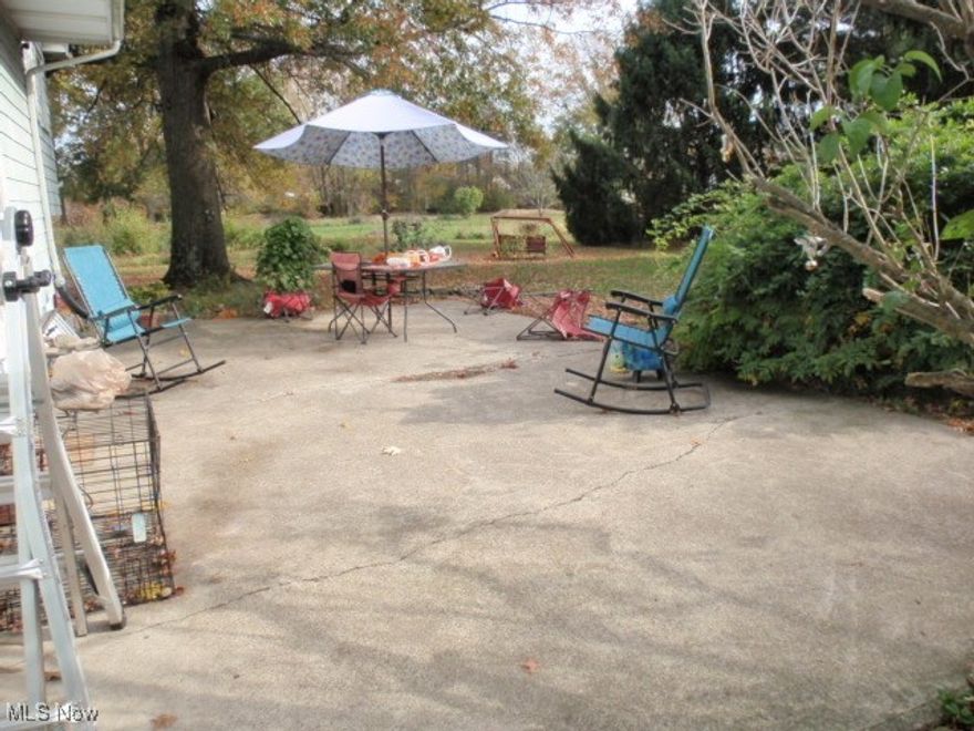 This home was built by and occupied by same family since 1947; now being sold to settle estate.  Home is much larger on the inside than it appears from the exterior.  The first floor has large living room, bedroom, laundry, full bath and kitchen.  Upstairs you'll find 4  additional bedrooms.  2 steps down from the kitchen is a large formal dining room that is open to the family room with fireplace/woodburning stove and access to rear deck.  Three steps down from the family room is a rec room w/2nd fireplace and another bedroom.  Three steps down from the rec room is basement area housing the mechanical systems.  Home is being sold "AS IS" and seller will not be making any repairs.  Inspections are for buyer information. The one acre lot has some mature trees and berry/grape vines.  County is calling for survey prior to next transfer.