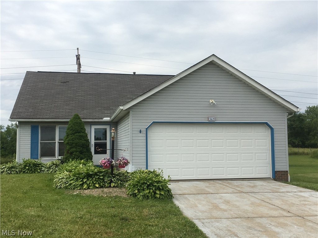 This 1-story Ranch style home has approximately 1080 sq. ft. of living space. The home features 2 bedrooms, an eat-in kitchen, a large living room, vaulted ceilings and a 1st floor utility room. Exterior features include a wooden deck and a 2 car attached garage with a concrete driveway. Gas forced air heat, city water and sewer. Ravenna School District. Great starter home or downsize! Freshly painted.