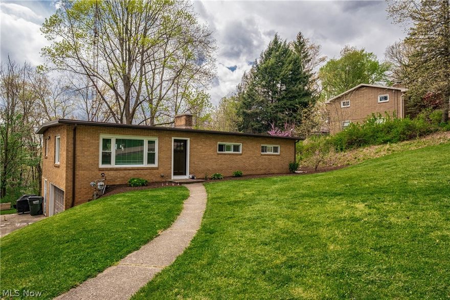 Charming Raised Ranch with all the right updates. Open spaces and large rooms make this a move-in ready home. Modern colors and new flooring throughout this home will go fast! The main level boasts a large Eat-in Kitchen, Family room w/ woodburning fireplace, 4 Bedrooms and Full Bath. The Walk Out Lower Level offers another 600+ square feet in the Family/Media room w/ fireplace, Laundry room and 2nd Full Bathroom. The oversized 2 car garage has space to store your cars and extra toys. All of this on a private/wooded .8 Acre lot.