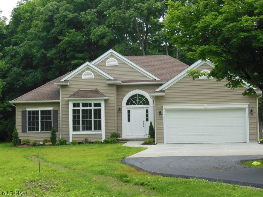 Newly built 3 bedroom, 2 bath ranch on 1.29 acres. Newly paved and landscaped yard. Foyer open's to large great room with open floor plan. Upgrades include vaulted ceilings, granite throughout with marble gas fireplace. Master has upgraded lighting package w/glamour bath and walk in closet. Must see extra lot available.