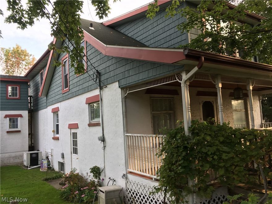 This home is handicap accessible with ramp and elevator. Located just minutes from two hospitals, a shopping center with grocery store and EZ access to the freeway's.Sanitary sewer is available and can be tied in later. The home also features a natural gas generator, and a barn with several other out buildings. This truely is one worth seeing.