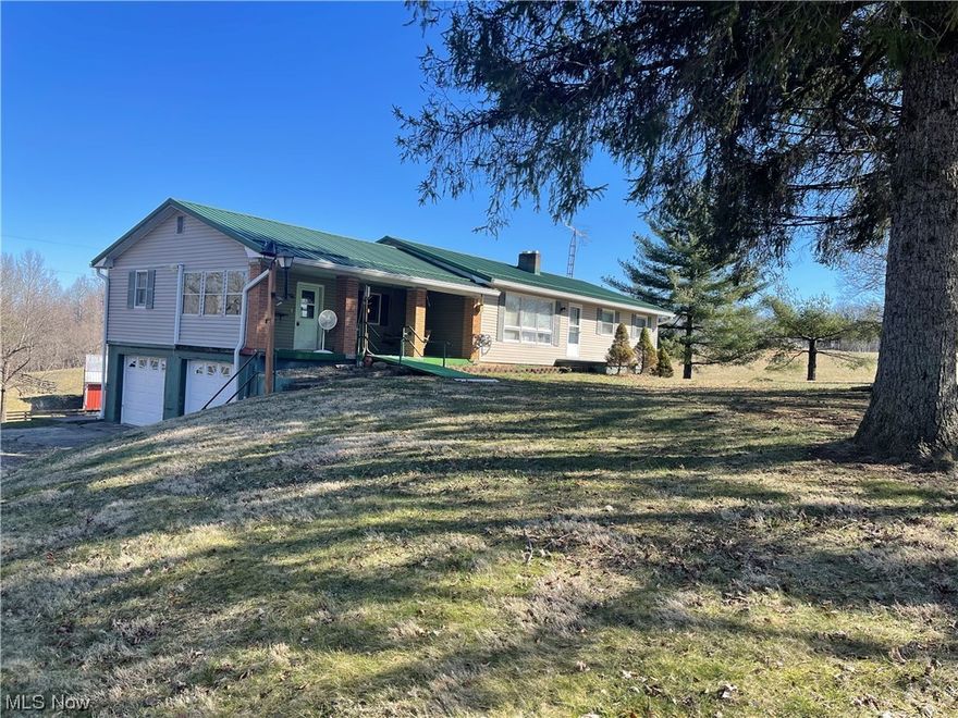 Here is your chance to have a piece of the country.  Want to raise farm animals?  Cattle, Sheep, Goats, Chickens or Horses, your choice.  Check out this Ranch style home with four bedrooms and two full baths, two family rooms, one on the main level one on the lower level walkout basement. This home could be used also as an In-law suite.  This Property has 3.1 acres with Large Pole Barn, concrete work shop and attached is a lean to for storage.  Next to the barn is a 3 sided storage building for your farming needs.