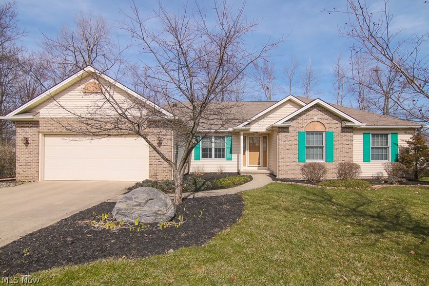 Be first to preview this custom designed ranch in Cartwright Hertiage Estates. Situated on a private culdesac wooded lot with all the amenities. Open and inviting as you enter into this lovely home. Large vaulted great room has a brick fireplace with gas starter. Four solar tubes allow natural lighting through out the day. A formal dining room with recessed ceiling and crown molding. Very functional custom hickory kitchen.  Features include: pull out shelves, wine rack, lighted display cabinet, walk in pantry, island, and information desk. Sliding doors lead to a lovely landscaped deep lot with trees and perennials. 900sq ft. 3-tiered lighted waterfall and Cyprus deck recently refinished. A trellis that will fill in this spring for your extra privacy. Fenced yard with 14x10 powered shed. Owners suite has luxury bathtub with jetted tub, walk in shower, and double sinks. Main bath with double sinks. Deep walk in closet. First floor laundry room with closet. Two pull down steps for attic