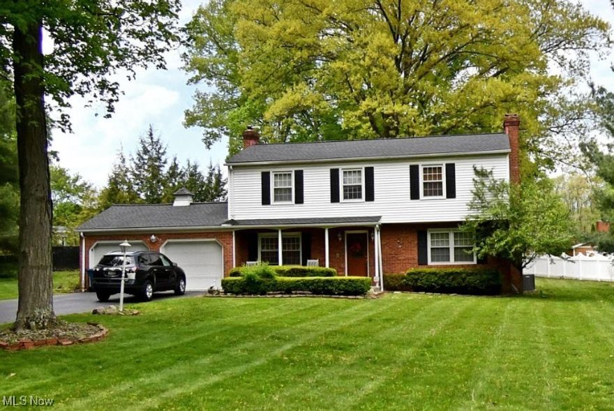 Come see this beautiful 4-bedroom home with 2.5 baths, a large, enclosed sunroom, fenced in yard, double car attached garage, wood floors, and 2 fireplaces.