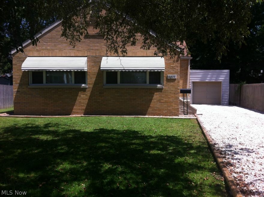 Brick Ranch in Boardman schools. All freshly painted interior with neutral color scheme. Hardwood floors throughout and new kitchen  floor. Updated bathroom. Nice size, fenced in yard with low maintenance. Spic and span , freshly painted basement and garage. Newer roof, furnace ,windows,  glass block  widows, hot water tank and updated  electrical. Updated bathrooms.  Fully insulated with blown in cellulose insulation,  Energy efficient home with very  low utility bills. Move in ready and cheaper than renting! All appliances can stay; stove, refrigerator, washer, dryer window A/C unit, microwave, and dehumidifier. Seller offering a home warranty.