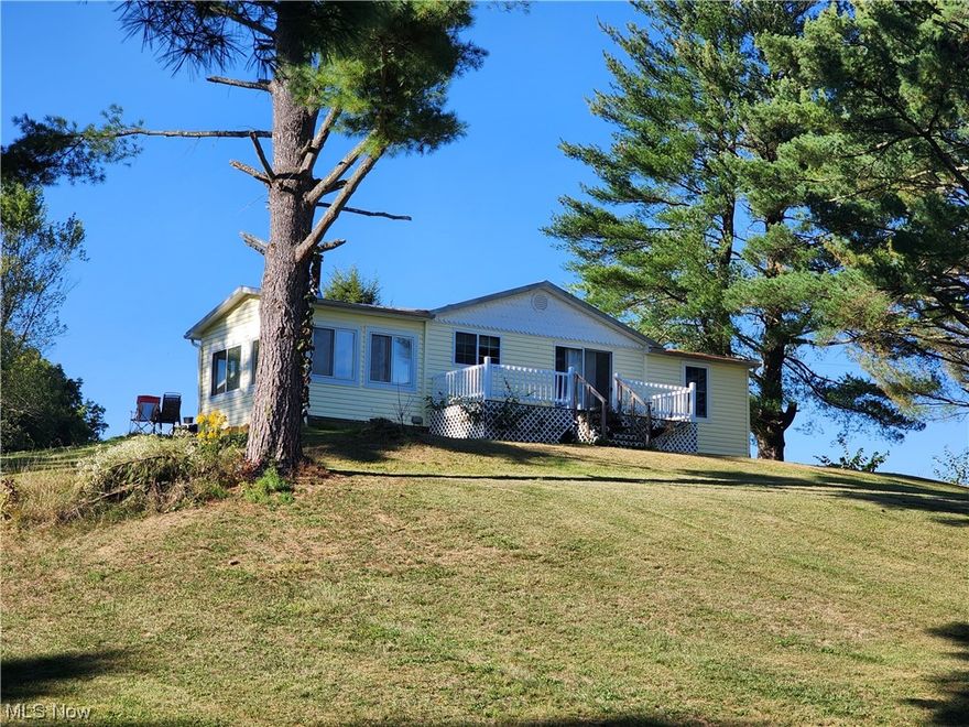 2-3 bedroom home located in Noble Local School District. Just minutes from I-77. This cute home offers 2-3 bedrooms, or office space with a dining room, kitchen and great sunroom for plenty of natural light, 1.5 baths and a full walk out basement for more living space. Private and secluded, you will enjoy the country location with over 3 acres of privacy. Call today for a private showing.