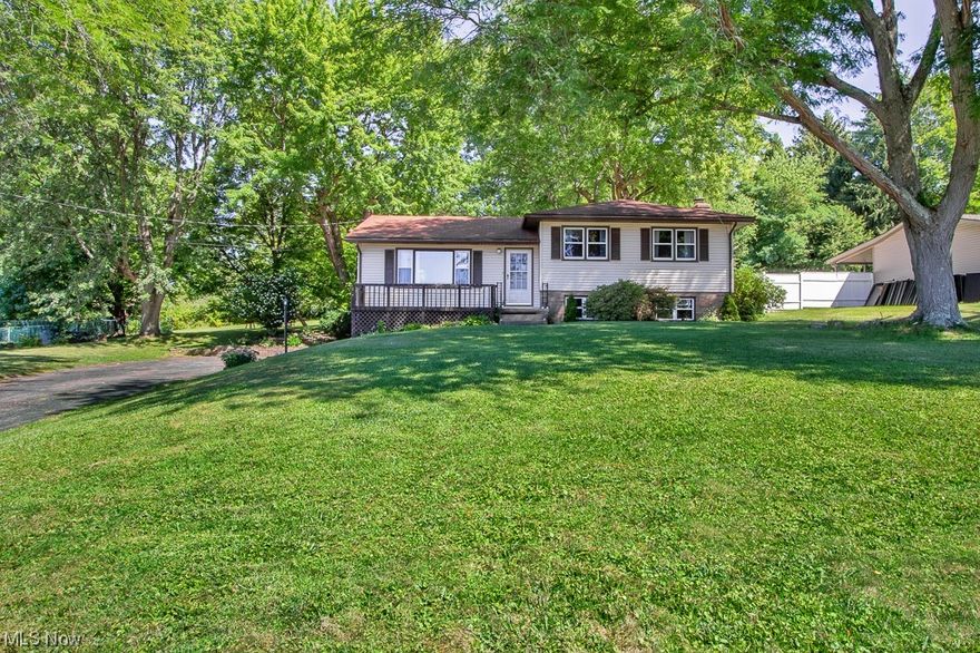It's the fun yard home in Lake schools! This split level home sits on 1/2 acre of park like greenery with a tree house, picnic table, swing, sun
room, storage barn, fire pit, sandbox, and plenty of room for some creative gardening. The beautifully landscaped home has 3 bedrooms and 2
full bathrooms, a two car attached garage, paved driveway, and plenty of equity with some simple cosmetic updates. All appliances are
included in sale, refrigerator, range, microwave, washer, and dryer. Professionally waterproofed and updated yearly by Ohio State
Waterproofing. Come see why we call it the fun yard!