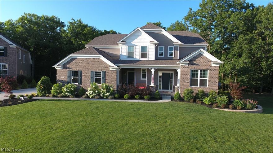 Masterful design & modern luxury are uniquely embodied in this 4 bed & 4.5 bath Pulte Pontiac floor plan! Beautiful engineered HW floors & plenty of natural night flow throughout the home's open, airy layout. Enjoy gatherings in the generously-sized living/kitchen area graced by a fireplace, windows w/ custom blinds & entrance to the Trex deck. Kitchen will inspire your inner chef w/ granite counters, center island w/ seating, large pantry, SS appliances, wine/bev fridge & dining area. Adjacent morning room offers a peaceful space to relax by the 2nd fireplace! Planning center offers convenience to daily tasks! Spacious DR, private study, laundry room, half bath & utility room (w/ built in lockers!) complete the main floor. Master features a walk-in closet w/ center island & closet system, sitting area & full bath w/ walk-in shower, dual vanities & soaking tub! Bonus room tucked between bedrooms offers a playroom/additional living room area. Bed 2 features en-suite bath. Bed’s 3 & 4 ar