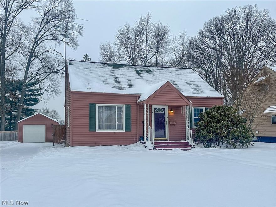 This charming four-bedroom Cape Cod is located in an established NE neighborhood, conveniently close to grocery shopping, restaurants, and schools. The main level features a spacious living room, an eat-in kitchen with access to the deck and the fully fenced backyard, two comfortable bedrooms, and a full bath. Fresh paint and newer LVP flooring add a clean, updated feel. Upstairs, you'll find two large bedrooms with the original hardwood floors and a nice hall closet for extra storage. The full basement includes a laundry area, a shower, and excellent potential to be finished into additional living space. An updated electrical panel adds peace of mind. Outside, enjoy a private backyard perfect for relaxing or entertaining, complete with a deck and full wood fencing. The detached one-car garage features a newer roof and a brand-new garage door. Schedule your showing today and see how this adorable home offers comfort, convenience, and room to grow.