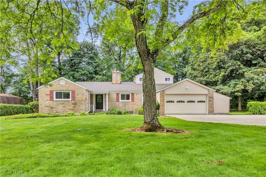Tucked away in a quiet Independence neighborhood, 8918 Bramley offers timeless Cape Cod charm and incredible potential on a lush, tree-lined lot. The classic stone front and oversized driveway welcome you to a home that blends character, space, and a scenic, park-like setting. Inside, natural light fills the spacious great room, where a cozy fireplace and views of the wooded backyard create a peaceful retreat. The eat-in kitchen features ample cabinetry and flows into a dining area with built-in shelving and direct access to the breezeway—ideal for a sitting area, mudroom, or main-floor laundry.  The first-floor layout includes two generous bedrooms, including a spacious owner's suite with a private en-suite bath. Upstairs, an oversized third bedroom with a full bath offers flexible living space for guests, a home office, or hobbies. Downstairs, the finished rec room adds even more room to unwind or entertain, plus there's plenty of storage and a second laundry area for added convenience.  While this home awaits your personal touch, it boasts solid bones, functional space, and a setting that’s hard to beat—just minutes from the Towpath Trail, Brecksville Reservation, and Cuyahoga Valley National Park. With quick access to shopping, dining, and major highways, this is a rare opportunity to make your mark in one of Independence’s most desirable areas. Being SOLD AS-IS!