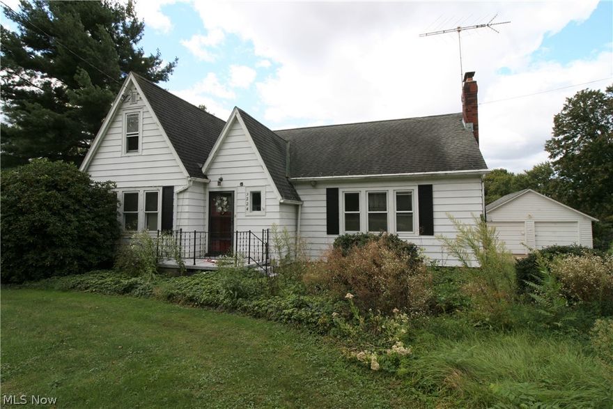 *Investor special* This 2000+ sqft home is looking for a new owner and some TLC. A cape cod on 1.21 acres, this home has a full bathroom upstairs with 1 bedroom and a large loft area. 1st Floor with 2 bedrooms and another full bath. Huge living room with a fireplace, kitchen opens into the dining room which has a slider on to the back deck. 2 car detached garage with a storage area behind. And a separate shed so you'll have plenty of storage. Great built ins, original wood work and doors. Tons of potential. New septic system will be installed at seller's expense. Property being sold in its “As Is” present physical condition.