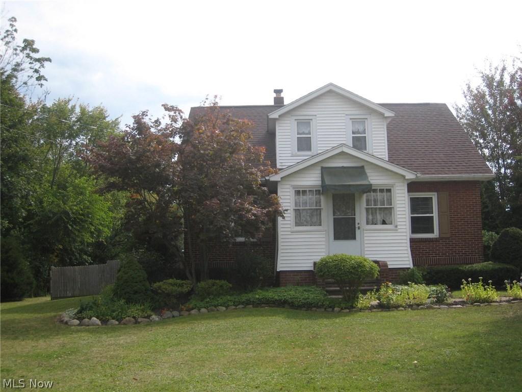 As you pull in the drive, the True Pride of Ownership shines throughout the meticulously maintained and improved 3 BR 1.5 Bath Brick Cape Cod on 1.07 acre lot. The living room, Dining room and hallway feature recently installed laminate flooring that accentuates the natural woodwork. The freshly painted walls of soft gray reflect the natural light that filters throughout the house. The Kitchen has ample cupboards and stainless steel appliances. The full bath was remodeled recently and features updated fixtures, lighting, sink, flooring and commode. First floor bedroom with wool Persian carpet is being used as an office. Up stairs are 2 good size bedrooms and a small room that could be a nursery, office, playroom, or maybe a walkin closet. Great closet space and storage throughout. The basement has another half bath, all painted and ready to finish. Other updates include the septic system, roof, hot water tank, vinyl replacement windows, electric panel and electric heated fir