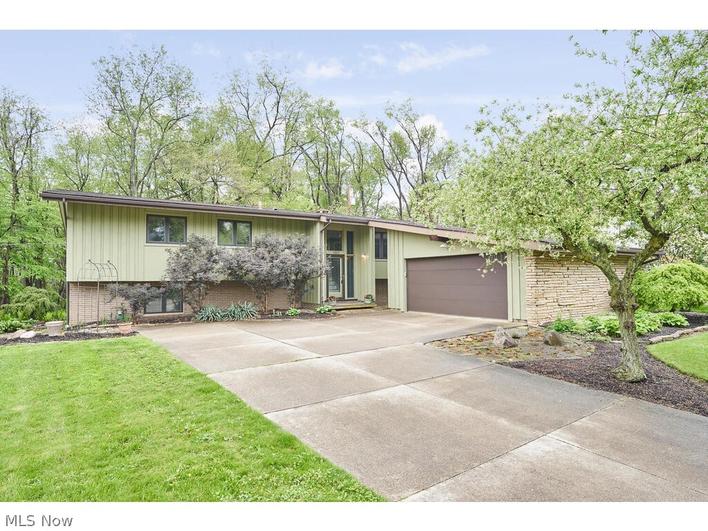 PRIVATE SHOWINGS ONLY – NO OPEN HOUSE -
FANTASTIC FIND with in-law suite! One of a kind, Mid-Century Contemporary home, overlooking woods and situated on a cul-de-sac! 4 Bedrooms, 3 FULL Baths, a dramatic Great Room with cathedral ceilings and fabulous fireplace! Kitchens and Baths have been updated and the entire house has been impeccably maintained. Deck, private patio/courtyard, and 2 car garage. This home is situated in close proximity to the Sand Run Metro parks, the Merriman Valley, Fairlawn, access to I-77, and hundreds of restaurants, and shopping and entertainment venues. Delayed possession will be important to the Seller. Seller plans to review all offers no later than Monday, May 10, at 5:00 PM.