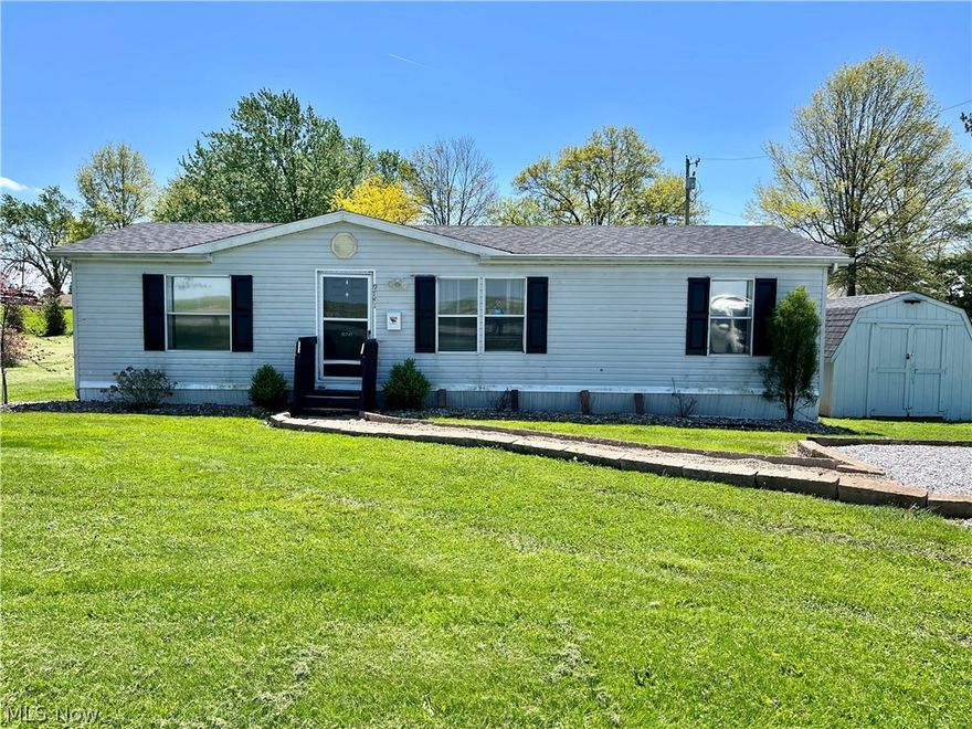 This is an absolutely, adorable 3 bedroom, 2 full bath home that sits on a beautiful, leased lot in rural Wayne county!  The back yard is peaceful with a nice deck for relaxing.  There is large shed for storage. Nearly everything has been upgraded over the last few years including a new roof, gutters & downspouts, New A/C and new carpet throughout, all interior painted.  The kitchen cabinets and countertops replaced in 2022 as well as bathroom vanities and fixtures, master bath flooring.  Some ceiling fans and light fixtures replaced.  The washer & dryer stay with other kitchen appliances.  There is a transferrable water softener contract with Culligan available. There is virtually nothing to do except move in! This one won't last long!