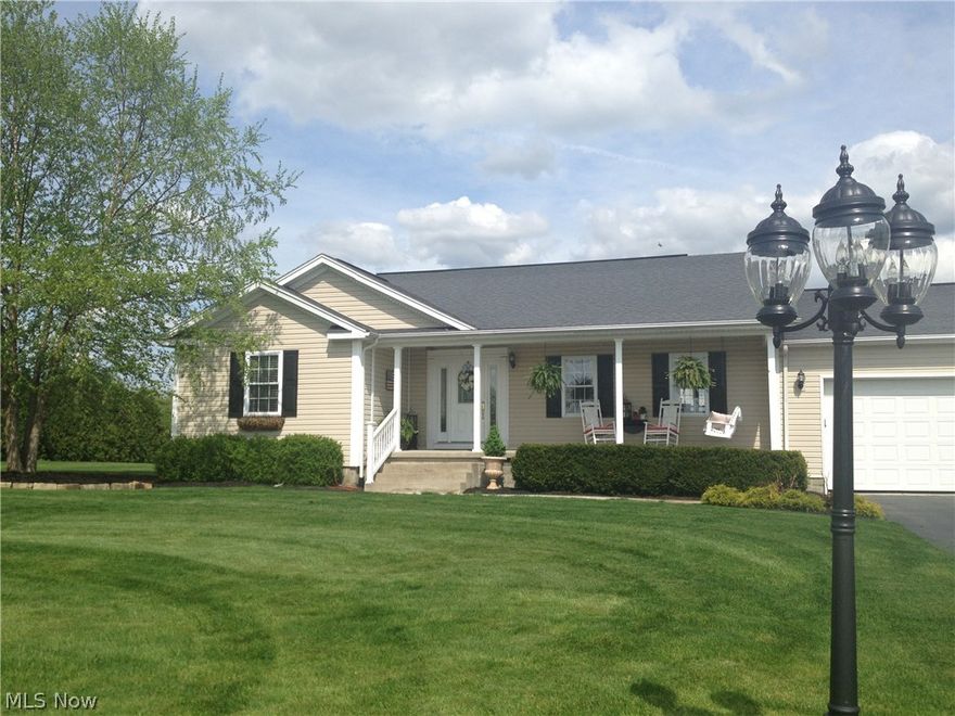 Lovely 3 Bedroom 2 bath Ranch situated on 1 acre in a quiet neighborhood. Open concept kitchen features all appliances. Dinning area with beautiful window seat for spectacular view. Large master bedroom.  Above square footage reflects finished basement  w/rec room, bedroom and full bath. 2 car attached garage and also 2 car detached provides perfect area for storage or workshop. Enjoy the private deck or an evening on the front porch swing.