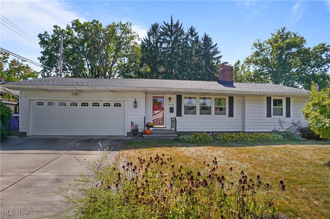 This meticulously maintained 2 bedroom, 1 bath is a real gem! There are beautiful hardwood floors in the Living & Dining rooms, hallway and both bedrooms. The family room is very special with hand painted black & white checkered flooring, sliding barn doors & door to the back yard. As you enter the living room from the front door you will see the large picture window and fireplace with built-ins, ready to enjoy on winter evenings. The dining room is situated in the center of the home, very nice sized, and leads into the family room. The kitchen was remodeled in 2004, bathroom remodeled in 2014 and the entire interior is very nice and neutrally decorated. You will enjoy the beautifully landscaped yard, a perfect area to relax or entertain. It is conveniently located to the Market District and downtown shopping locations. Other updated include a new roof in 2020, insulation- 2022, Nature Stone garage floor- 2022, A/C- July 2025. This lovely home is turn-ley, ready for you to enjoy!