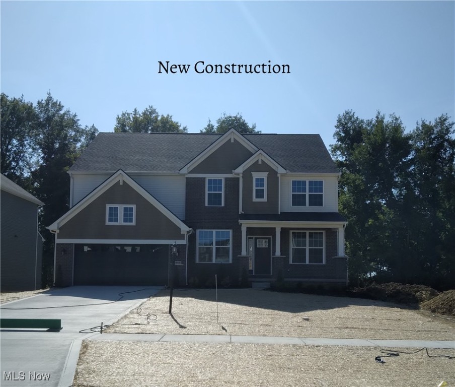 New construction ready for move in July 2025! Popular Buchanan plan in highly desired Windfall Estates. Located in the highly rated, very desirable Highland School District and Montville Township. Located minutes from I-71 in Medina County with easy access to Medina, Akron, Cleveland and adjacent to Thomas Currier Nature Park. This home offers a grand, 2-story family room with coffered ceiling and stone fireplace from floor to ceiling. Open kitchen with burlap cabinets, quartz countertops, SS appliances along with formal dining room for additional entertaining space. The home office is enclosed with double doors for added privacy. The rear staircase leads to 4 generous sized bedrooms with walk in closets. Double doors lead into primary suite with designer tile shower, granite countertops and spacious closet. The first floor includes upgraded luxury vinyl plank along with upgraded Kichler lighting. The unfinished, walkout basement is an open canvas for future living/entertaining needs. Finally, the 3-car tandem garage is a bonus. This home is a must see!